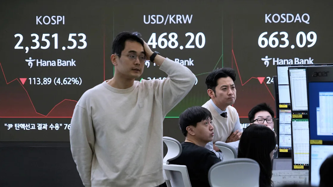 The Latest: Stocks are making wild swings as markets assess the damage from Trump’s trade war