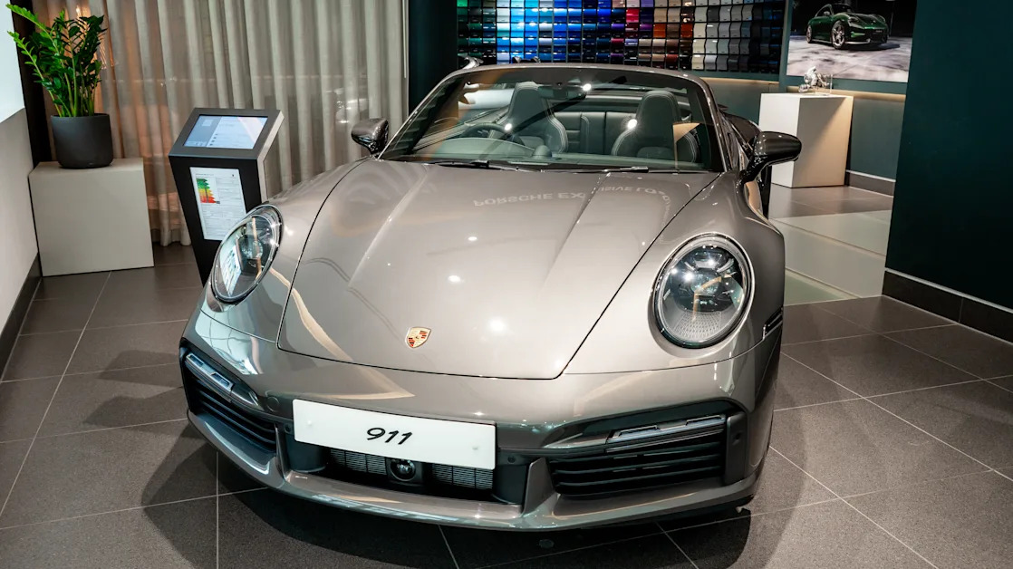 Porsche stock slides on profit forecast; company may ‘pass’ tariff costs on to customers