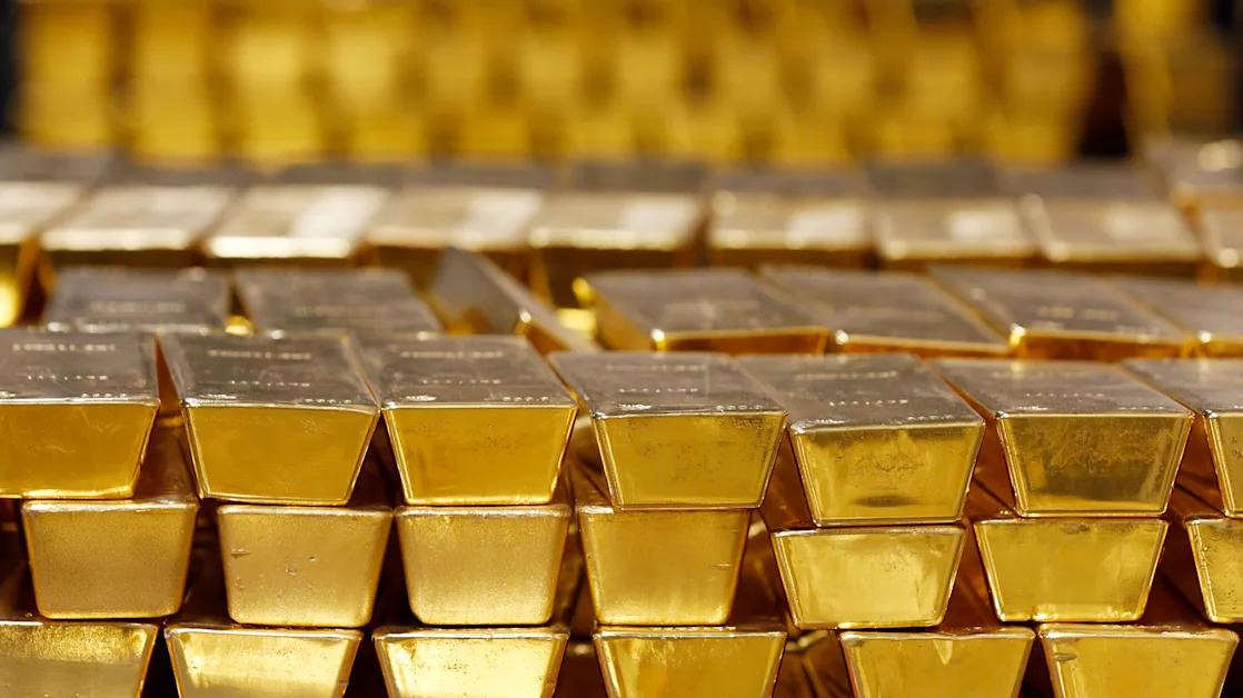 Gold rises to another record as anxiety grips markets. Here’s what you need to know