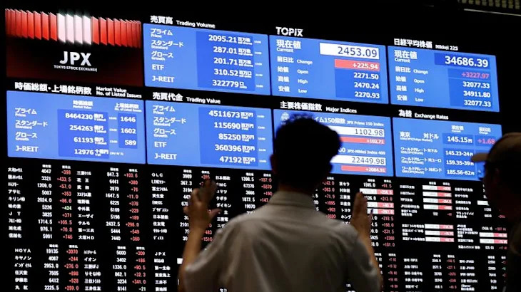 Stocks fall on Trump’s auto tariffs, China bucks the trend