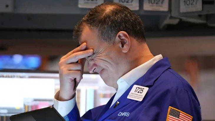 Photos show reactions at the New York Stock Exchange as Trump’s tariff announcements sent markets crashing and soaring