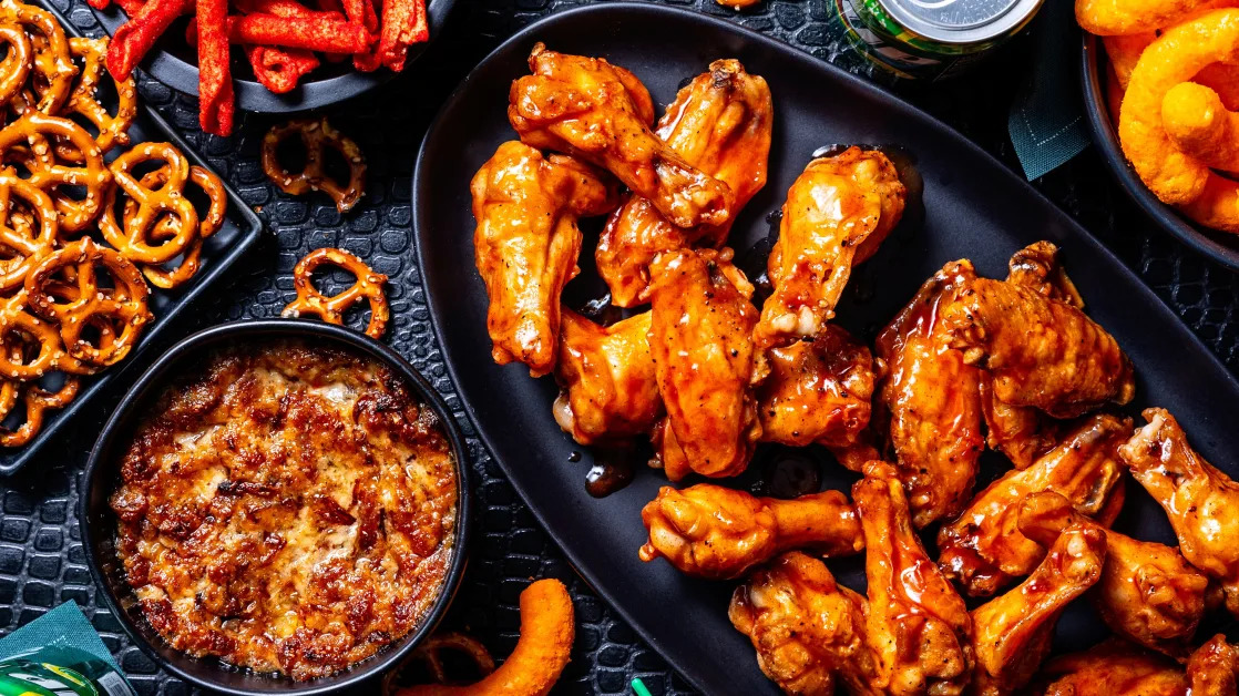 Super Bowl food stock plays: Wingstop, Domino’s poised to win on game day