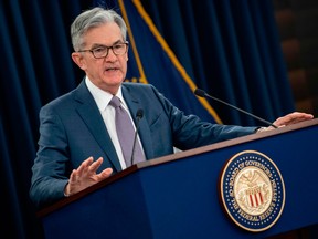 Fed holds zero rates as Powell warns virus spike hitting economy
