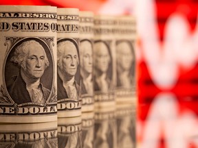 U.S. Dollar Surge Reduces Global Debt Pile for First Time Since 2018